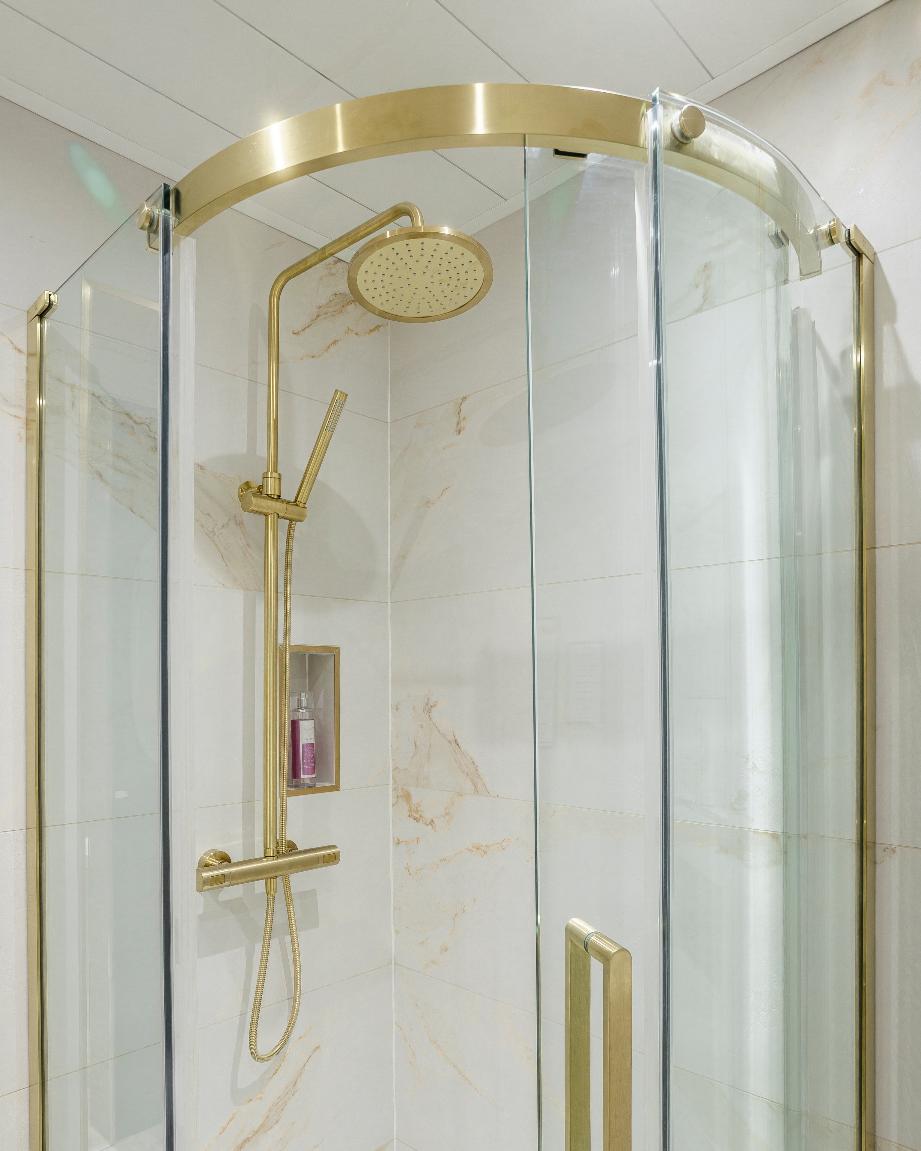 Curved gold shower