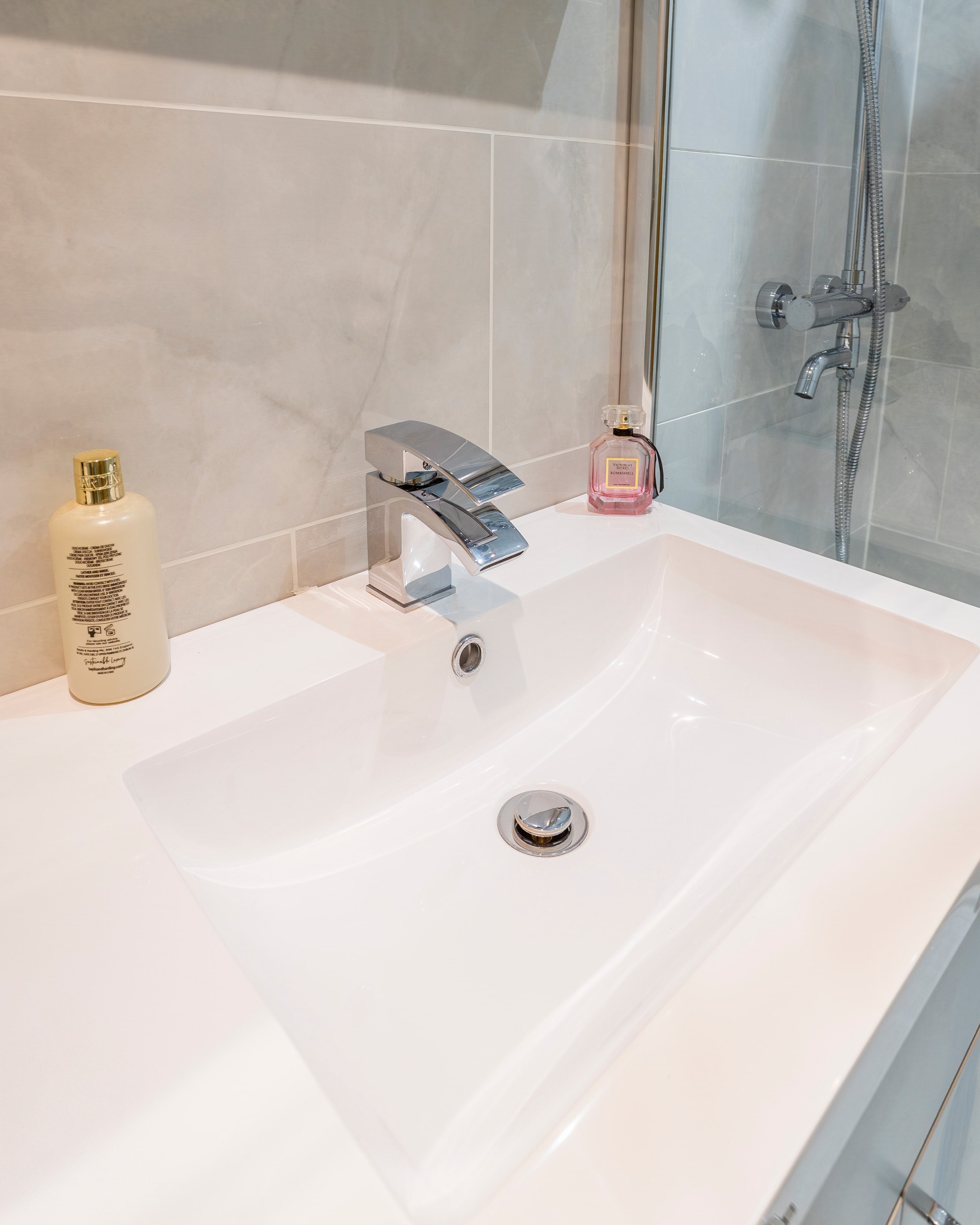 Grey marble basin chrome tap