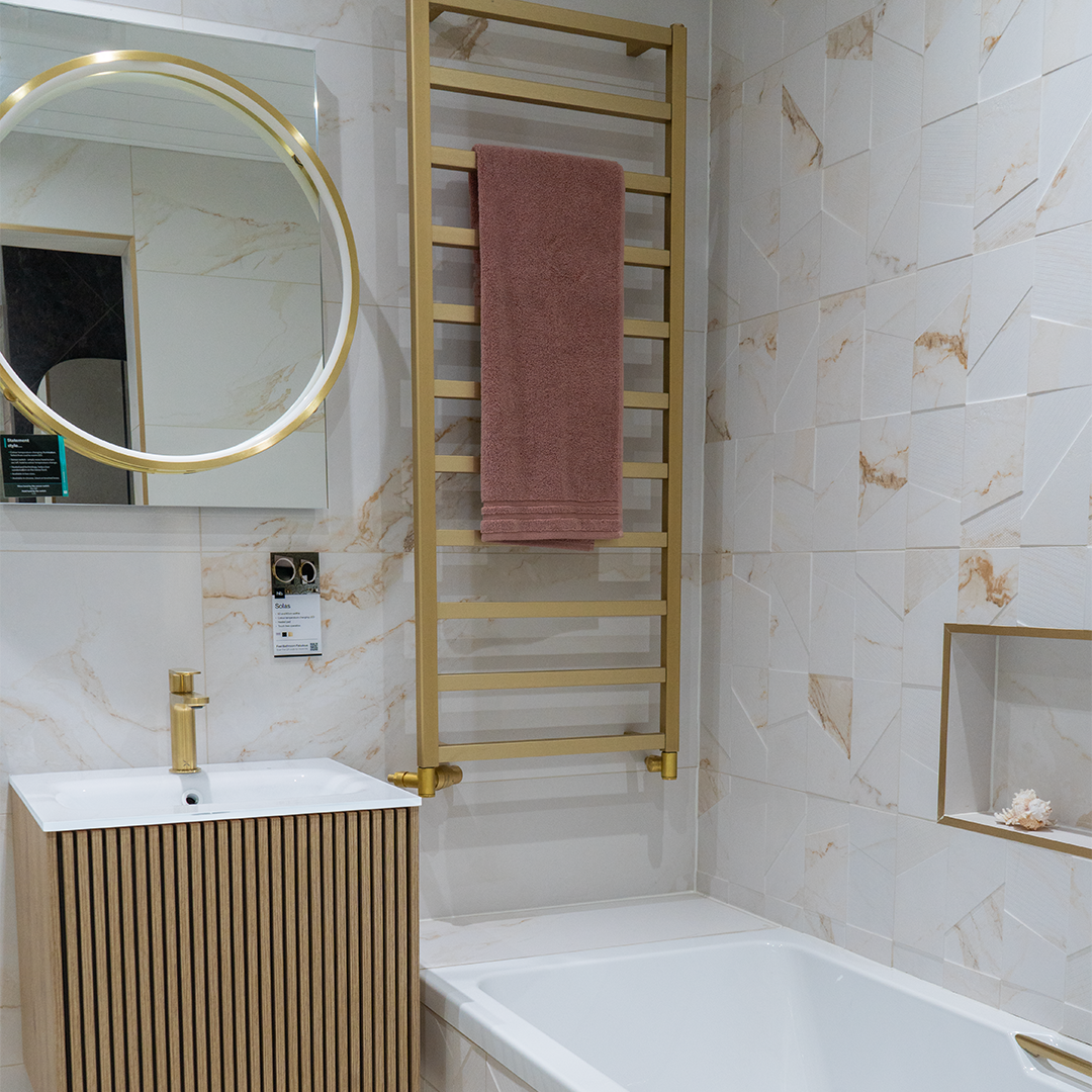 Marble bathroom with gold towel rail