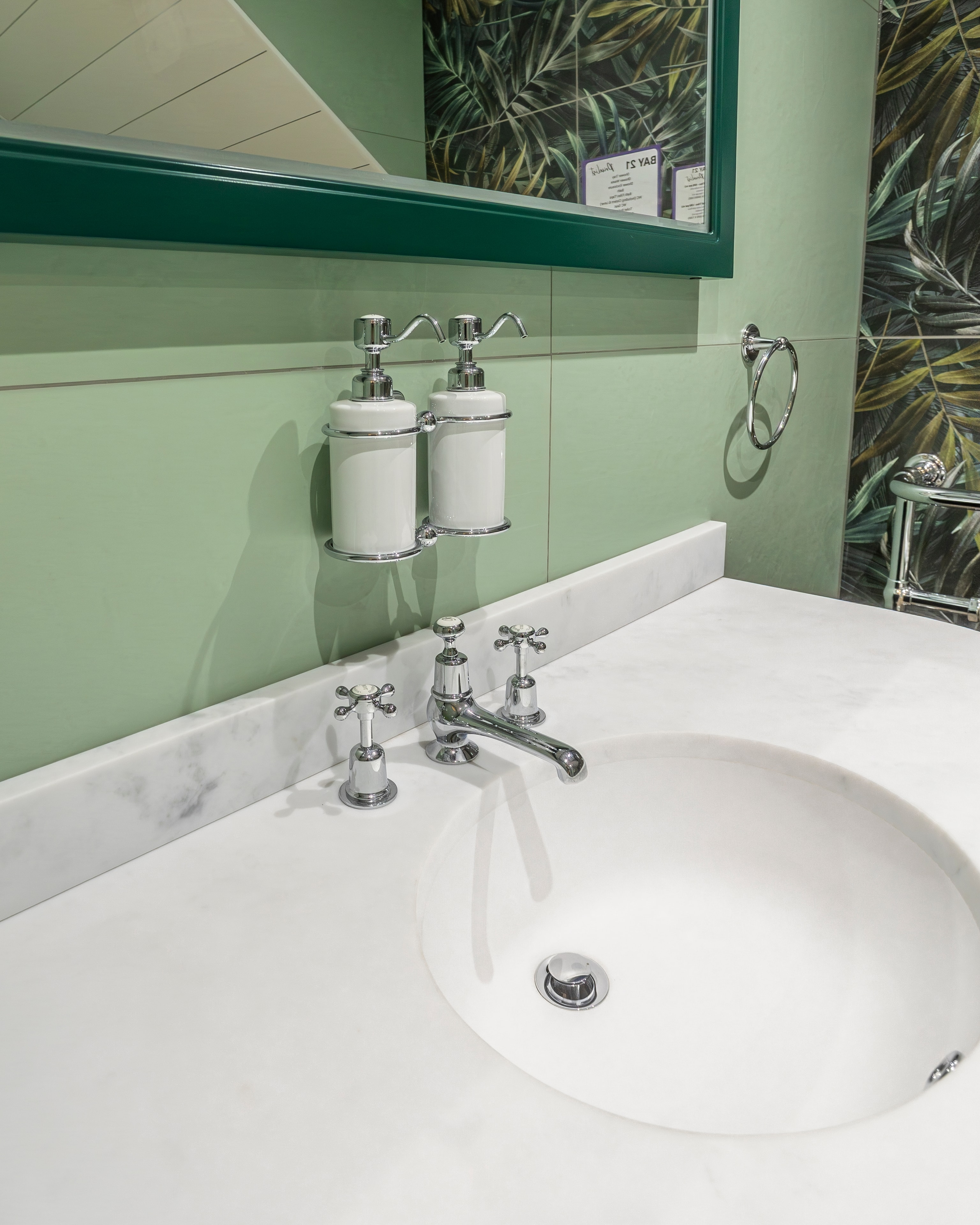 Sage green basin with dispensers