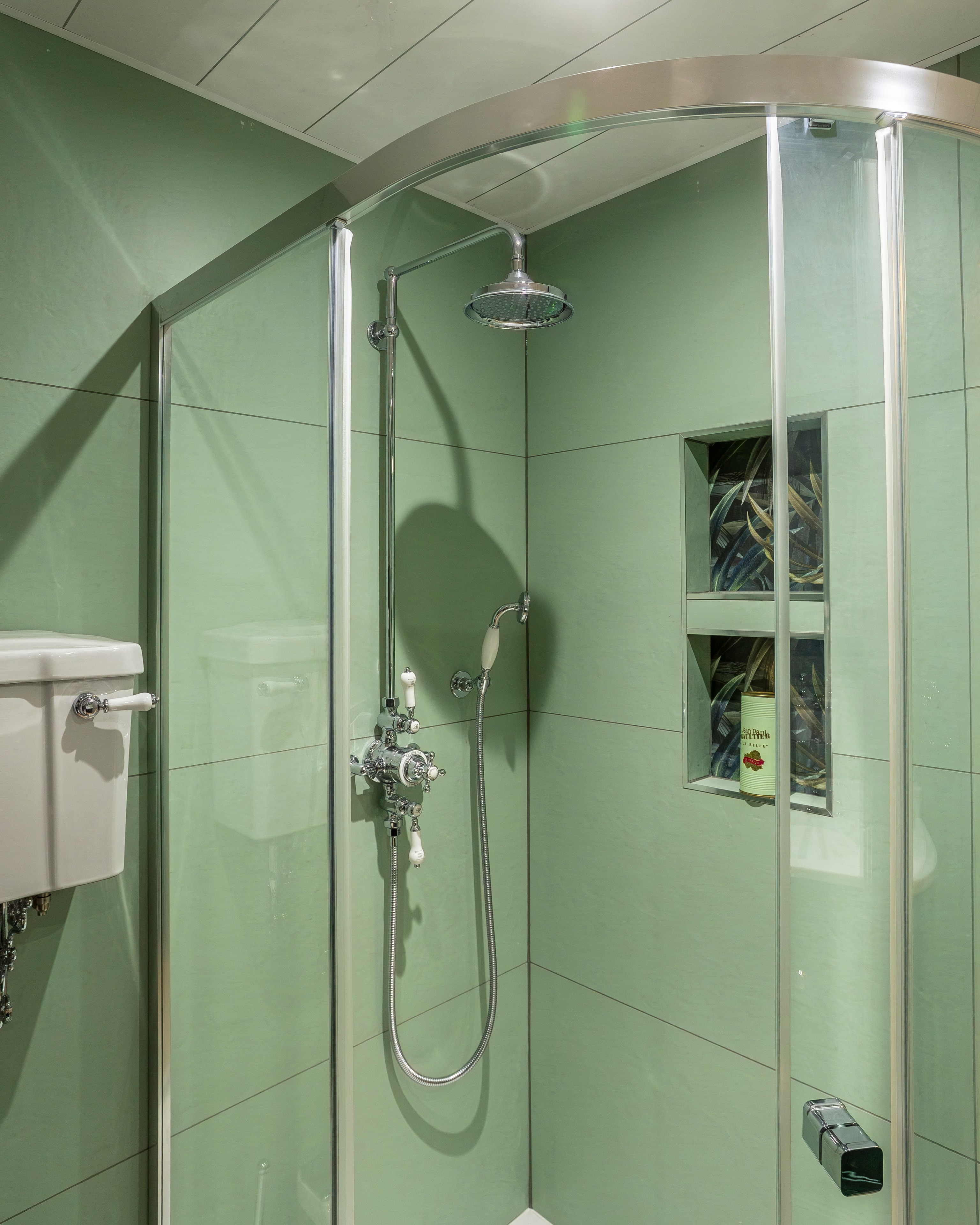 Sage green curved shower